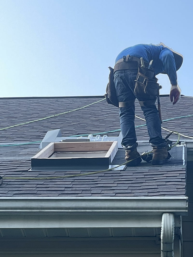 Worker installing skylight 1