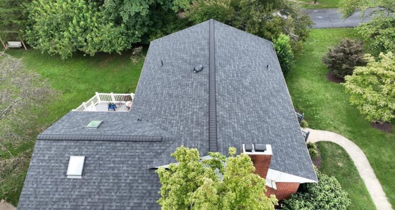 Completed residential asphalt shingle roof viewed from above