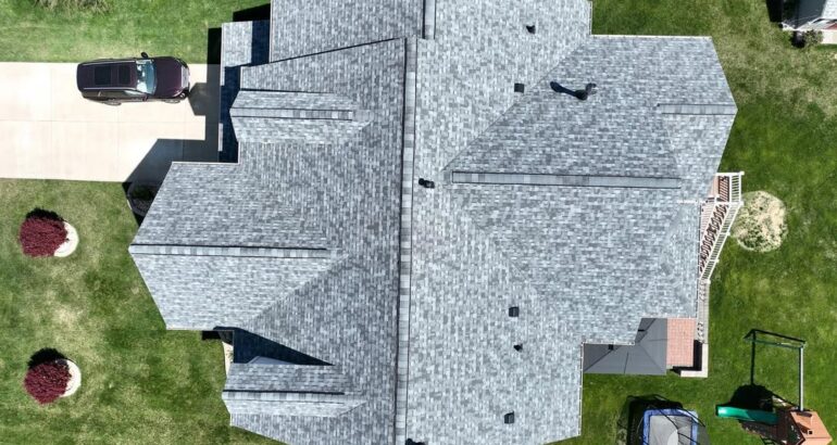 Aerial view of a gray asphalt shingle roof replacement in Northern VA