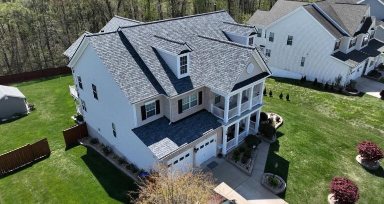 Residential roofing project with new gray asphalt shingles