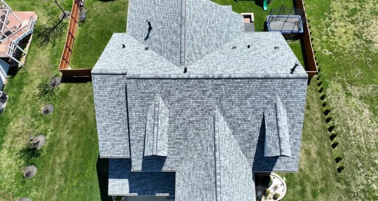 Aerial view of a completed residential roofing project