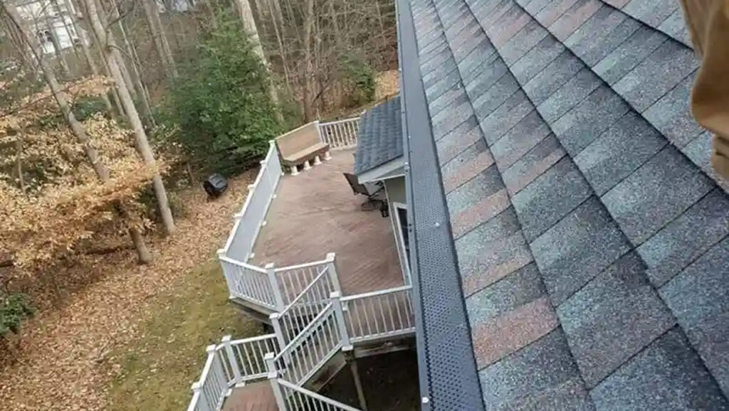 Full home gutter and downspout replacement on a residential roof in Northern VA