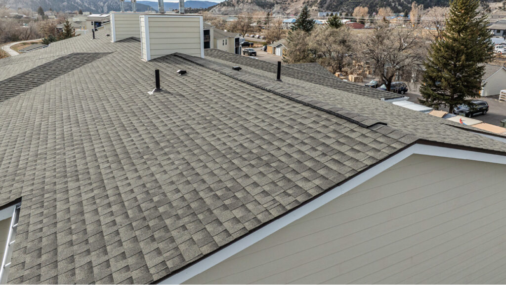 Commercial roofing replacement with asphalt shingles on a multifamily property in Northern VA