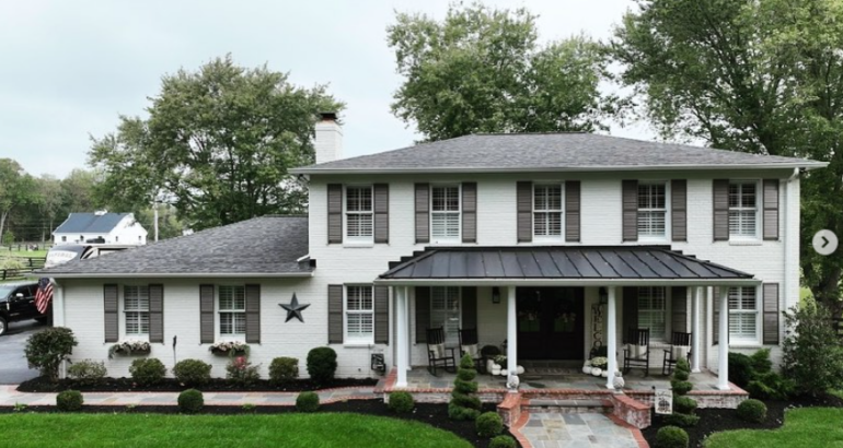 residential roofing in Ashburn VA on a two-story suburban home with a newly installed roof.